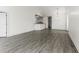 Spacious living room featuring modern flooring, open layout, and great natural light at 6010 Windsor Green Way # 301, Myrtle Beach, SC 29579