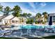 Sparkling community pool with ample seating and shade at 6010 Windsor Green Way # 301, Myrtle Beach, SC 29579