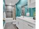 Bathroom featuring a tiled shower, a vanity, and modern fixtures at 6161 Inman Circle, Conway, SC 29526