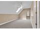 Bright bonus room features neutral walls and a skylight at 6161 Inman Circle, Conway, SC 29526