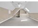 Bright bonus room with vaulted ceilings, fan, and skylight at 6161 Inman Circle, Conway, SC 29526