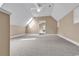 Spacious carpeted bonus room features neutral walls and a skylight at 6161 Inman Circle, Conway, SC 29526