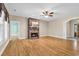 Living room boasts a fireplace, hardwood floors, and ample space for entertaining at 6161 Inman Circle, Conway, SC 29526