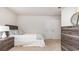 Bright bedroom boasts neutral carpet, and a comfy bed with stylish pillows and bedding at 651 Culmen Ct., Myrtle Beach, SC 29588