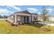 View of a cozy single-story home featuring a well-kept lawn and minimal landscaping, perfect for low-maintenance living at 659 Culmen Ct., Myrtle Beach, SC 29588