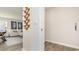 The hall leads into a room with vinyl floors and is trimmed with painted baseboards at 659 Culmen Ct., Myrtle Beach, SC 29588