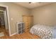 Cozy bedroom featuring wood floors and a closet with ample storage space at 6610 Mallard View Point, Myrtle Beach, SC 29588