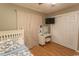 Comfortable bedroom featuring neutral tones, natural light, and a white vanity with storage at 6610 Mallard View Point, Myrtle Beach, SC 29588