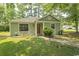 Charming home with green siding, well-maintained lawn, and inviting front entrance at 6610 Mallard View Point, Myrtle Beach, SC 29588