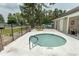 Inviting hot tub area with privacy fence, picnic table, and nearby clubhouse creating a relaxing outdoor space at 6610 Mallard View Point, Myrtle Beach, SC 29588