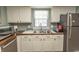 Bright kitchen featuring butcher block counter tops, stainless appliances, and light filled window at 6610 Mallard View Point, Myrtle Beach, SC 29588