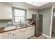 Bright kitchen featuring butcher block counter tops, stainless appliances, and light filled window at 6610 Mallard View Point, Myrtle Beach, SC 29588
