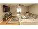 Comfortable living room with a sliding door entrance, entertainment center, and neutral decor at 6610 Mallard View Point, Myrtle Beach, SC 29588