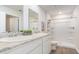 Bright bathroom with double sinks, granite counters, and a tiled walk-in shower at 664 Culmen Ct., Myrtle Beach, SC 29588
