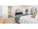Bedroom with an ensuite bathroom, neutral carpet, natural light and a decorative dresser at 664 Culmen Ct., Myrtle Beach, SC 29588