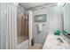 Full bathroom featuring a shower-tub combination and ample counter space at 705 11Th Ave. S, North Myrtle Beach, SC 29582
