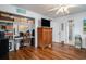 Charming bedroom featuring hardwood floors and a built-in desk area at 705 11Th Ave. S, North Myrtle Beach, SC 29582