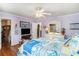 Bright bedroom showcasing wood floors, a ceiling fan and ample storage at 705 11Th Ave. S, North Myrtle Beach, SC 29582