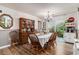 Dining room with wood floors, traditional furniture, and a sliding glass door at 705 11Th Ave. S, North Myrtle Beach, SC 29582