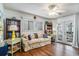 Inviting living room with hardwood floors and comfortable floral sofa at 705 11Th Ave. S, North Myrtle Beach, SC 29582