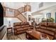 Spacious living room with soaring ceilings, wood floors, and comfortable seating at 705 11Th Ave. S, North Myrtle Beach, SC 29582