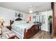 Charming main bedroom features coastal decor, a ceiling fan, and plenty of natural light from the windows at 705 11Th Ave. S, North Myrtle Beach, SC 29582