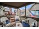 Cozy outdoor patio with comfortable seating and neighborhood views at 705 11Th Ave. S, North Myrtle Beach, SC 29582