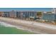 Stunning beachfront view of a resort, pools, and sand, with room to relax and play at 7200 N Ocean Blvd. # 260, Myrtle Beach, SC 29572