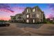 Inviting condo complex showcases brick and siding details, manicured landscaping and convenient parking at 730 Pickering Dr. # 303, Murrells Inlet, SC 29576