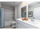 Well-lit bathroom featuring a double sink vanity and a shower-tub combo, complete with stylish decor at 739 Chazen Way, Longs, SC 29568
