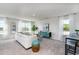 Spacious upstairs bonus room featuring many windows for natural light and bright decor at 739 Chazen Way, Longs, SC 29568