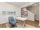 Cozy office space featuring a white desk, comfortable chair, and elegant artwork at 739 Chazen Way, Longs, SC 29568