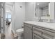 Well-lit bathroom featuring a modern vanity with white countertop and brushed nickel faucet at 7500 N Ocean Blvd. # 6122, Myrtle Beach, SC 29572