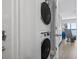 The laundry area has a stacked washer and dryer and is conveniently located near a bathroom at 7500 N Ocean Blvd. # 6122, Myrtle Beach, SC 29572