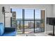 Bright living room with a large sliding glass door to a balcony with ocean view at 7500 N Ocean Blvd. # 6122, Myrtle Beach, SC 29572