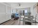 Open-concept living space with a dining area and ocean-view balcony access at 7500 N Ocean Blvd. # 6122, Myrtle Beach, SC 29572