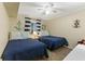 Cozy bedroom featuring twin beds with nautical-themed decorations and beachy accents at 824 N Waccamaw Dr. # 203, Murrells Inlet, SC 29576