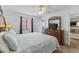 Relaxing bedroom featuring a dresser and natural light from the window and door to the patio at 824 N Waccamaw Dr. # 203, Murrells Inlet, SC 29576