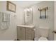 Modern bathroom features a stylish vanity, a decorative mirror, and organized shelving for a spa-like retreat at 88 Salt Marsh Circle # 22F, Pawleys Island, SC 29585
