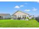 Relaxing backyard with patio, furniture, and grill, perfect for outdoor entertaining and enjoyment at 915 Sorano St., Myrtle Beach, SC 29579