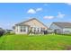 Lovely fenced backyard features a patio with furniture, offering a private outdoor space for relaxation at 915 Sorano St., Myrtle Beach, SC 29579