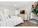 Inviting bedroom with hardwood floors, ceiling fan, and natural light from windows at 915 Sorano St., Myrtle Beach, SC 29579