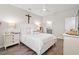 Comfortable bedroom with hardwood floors, a ceiling fan, and a spacious closet at 915 Sorano St., Myrtle Beach, SC 29579