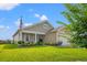 Inviting single-Gathering home with a well-kept lawn and cozy front porch at 915 Sorano St., Myrtle Beach, SC 29579