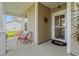 Welcoming front porch with cozy seating area to relax and enjoy the outdoors at 915 Sorano St., Myrtle Beach, SC 29579
