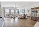 Spacious living room with hardwood floors, comfortable seating, and abundant natural light at 915 Sorano St., Myrtle Beach, SC 29579