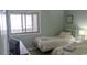 This bedroom features two twin beds, a television, and neutral decor at 9571 Shore Dr. # 318, Myrtle Beach, SC 29572