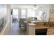 Bright condo living space with modern furnishings, stylish decor, and a seamless transition to the outdoor balcony area at 9571 Shore Dr. # 318, Myrtle Beach, SC 29572