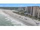 Expansive aerial view of a beachfront property with pools, beach access, and ocean views at 100 North Beach Blvd. # 710, North Myrtle Beach, SC 29582