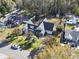 Aerial view of the home showcasing its spacious yard, mature trees, and neighborhood setting at 1044 Martin Ln., Conway, SC 29526
